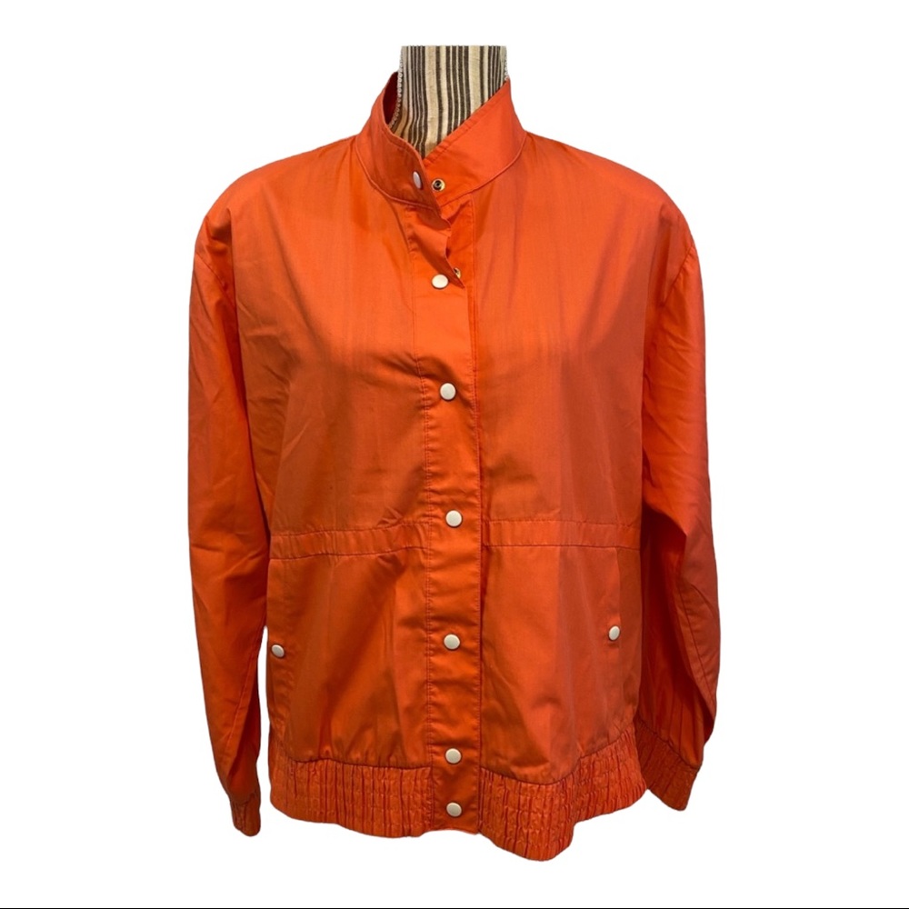 Orange white button snap jacket bomber style